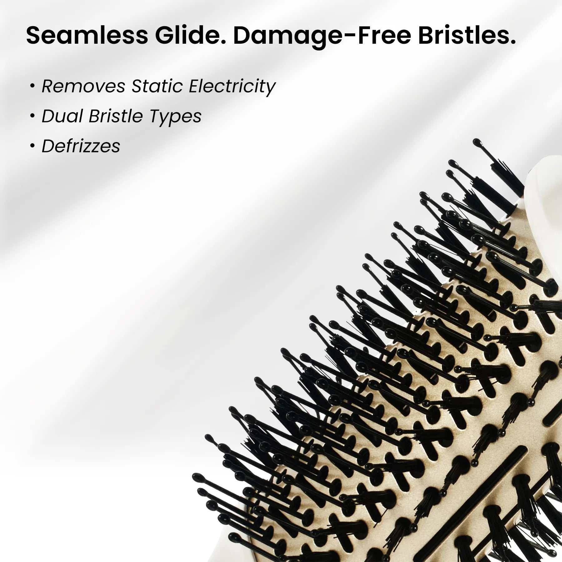 Hairbrush with black bristles on a white background, featuring text about its features.