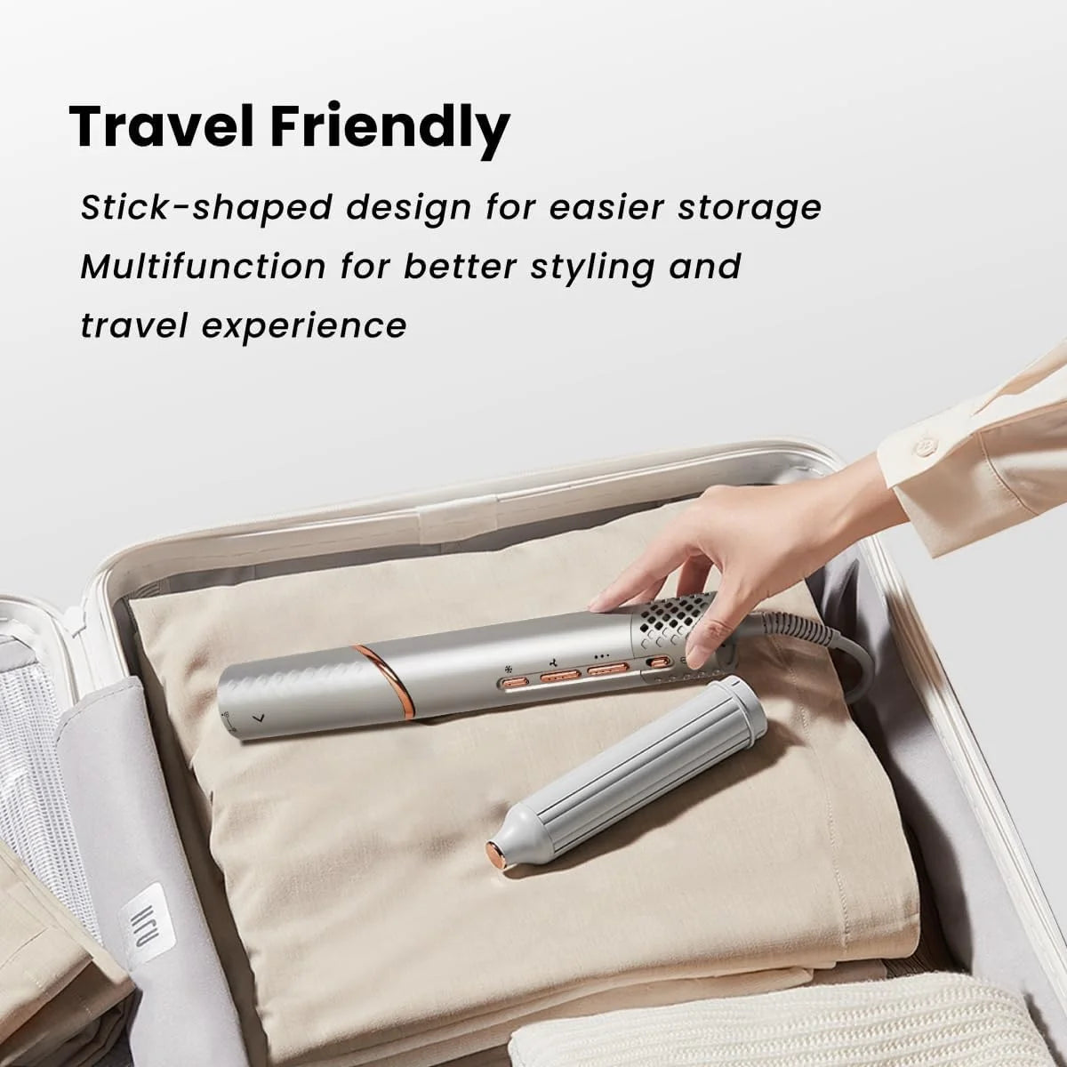 GLAMUP 5-in-1 silver and rose gold air wrap styler with rotatable handle and complete styling attachments.