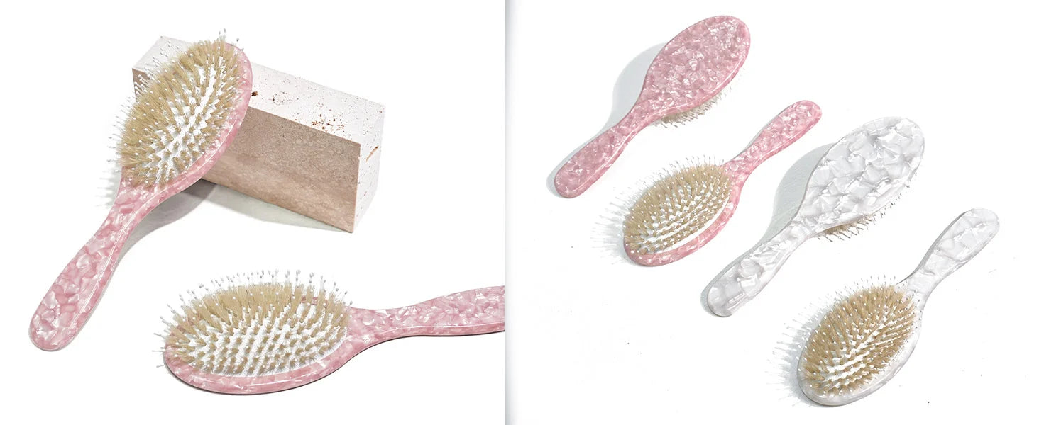 Glamup professional hair brush collection in dreamy blush pink marble acetate. Features multiple brush sizes with natural boar bristles, perfect for daily hair care rituals and styling to achieve a sleek, smooth look