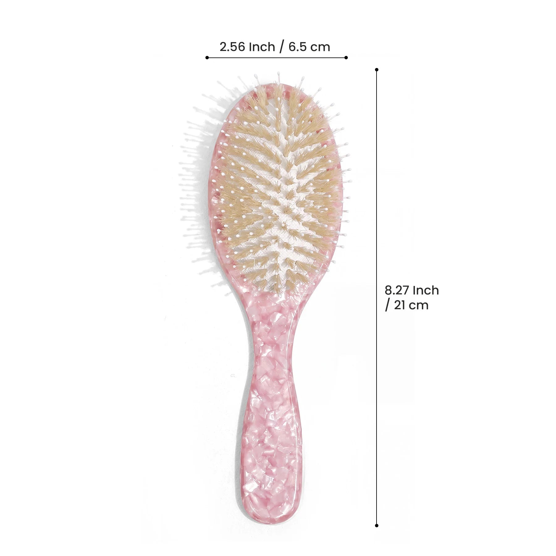 Close-up view of the Glamup full-size cushion hair brush in blush pink marble acetate, highlighting its ergonomic curved handle design and precise dimensions (8.27 inch / 21 cm) for a comfortable, non-slip grip during styling.
