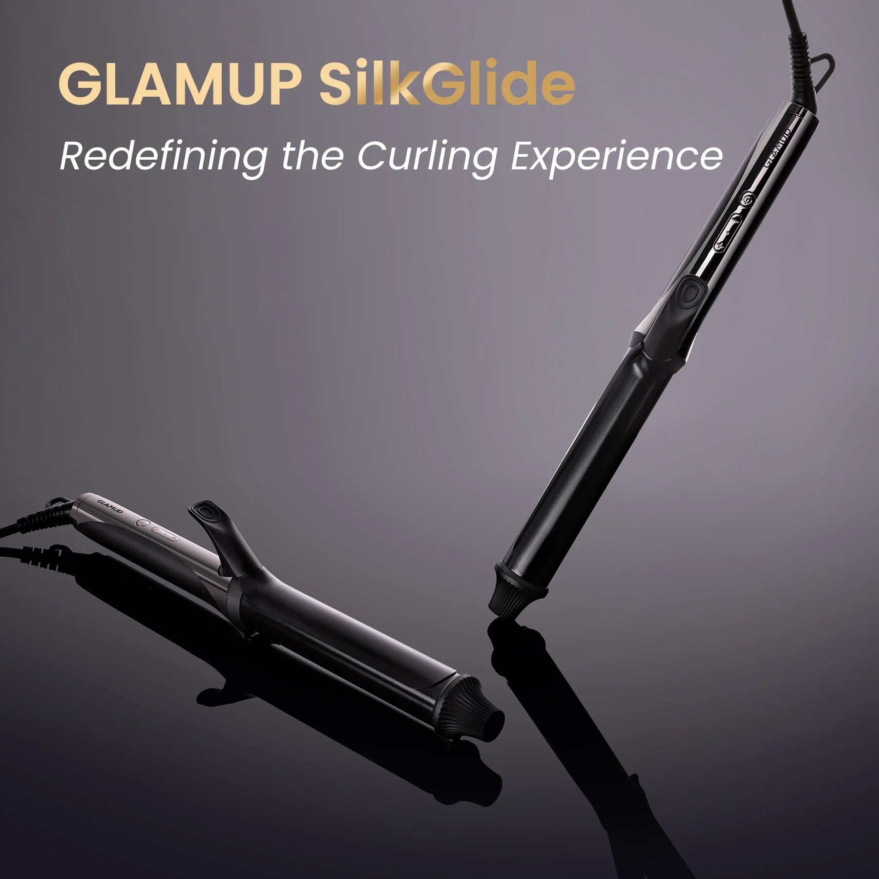 Elegant black and silver GLAMUP SilkGlide curling irons on a reflective luxury background.