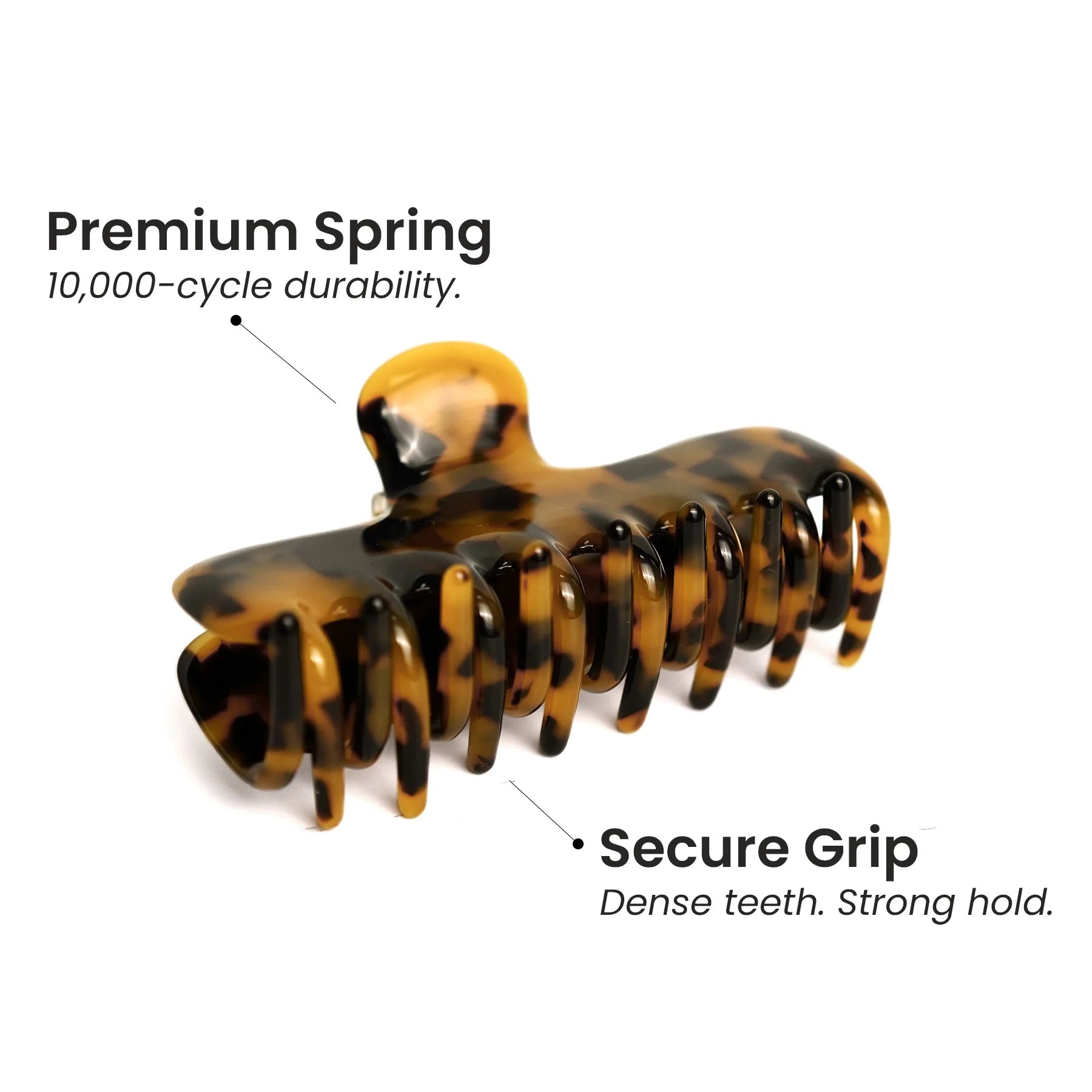 Detailed view of the premium spring and secure grip teeth on the Glamup "The Jennie" tortoise claw clip, designed for a strong hold.