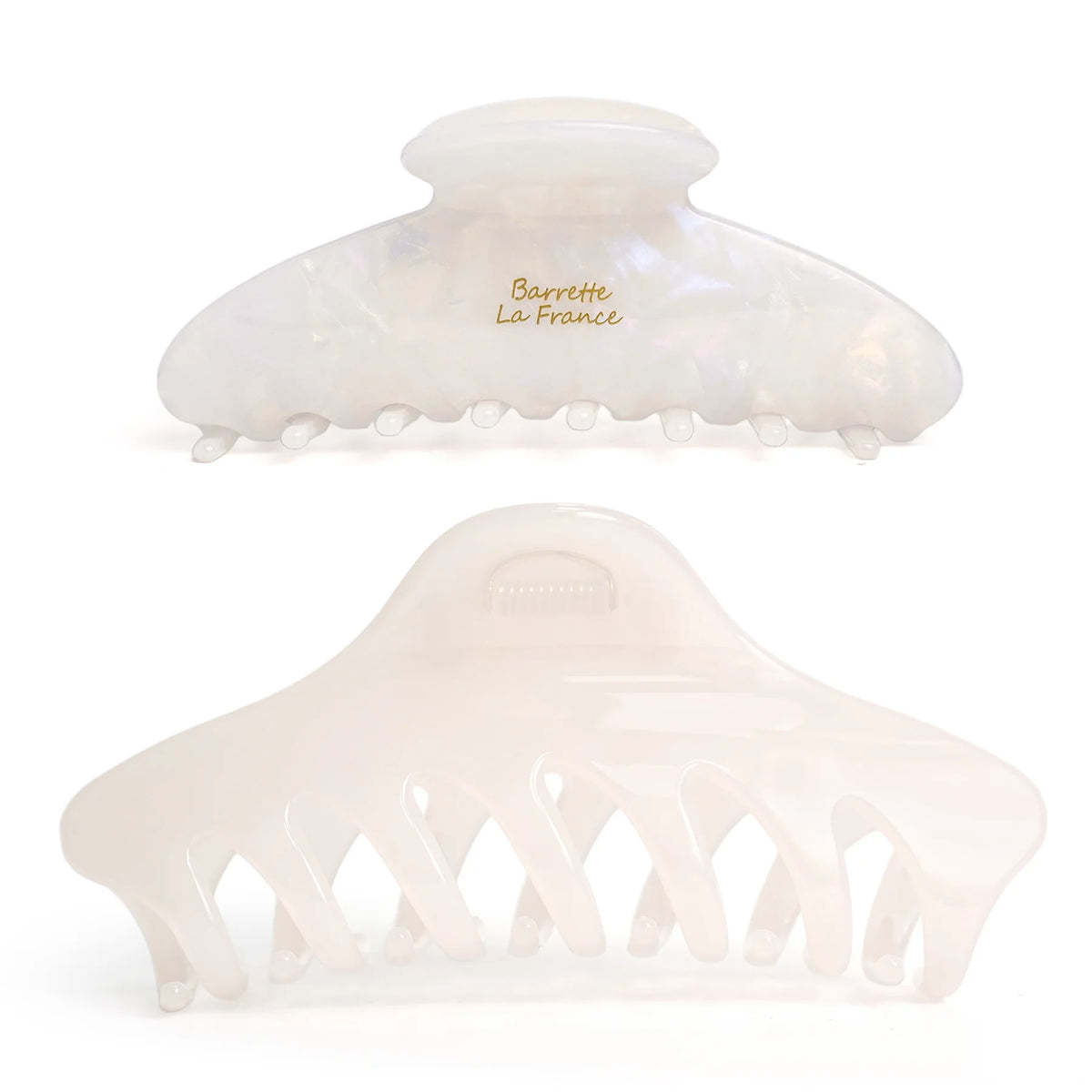 Studio display of the light-colored Glamup The Taylor claw clip set featuring an XL jumbo size and double-row teeth for all-day hold.