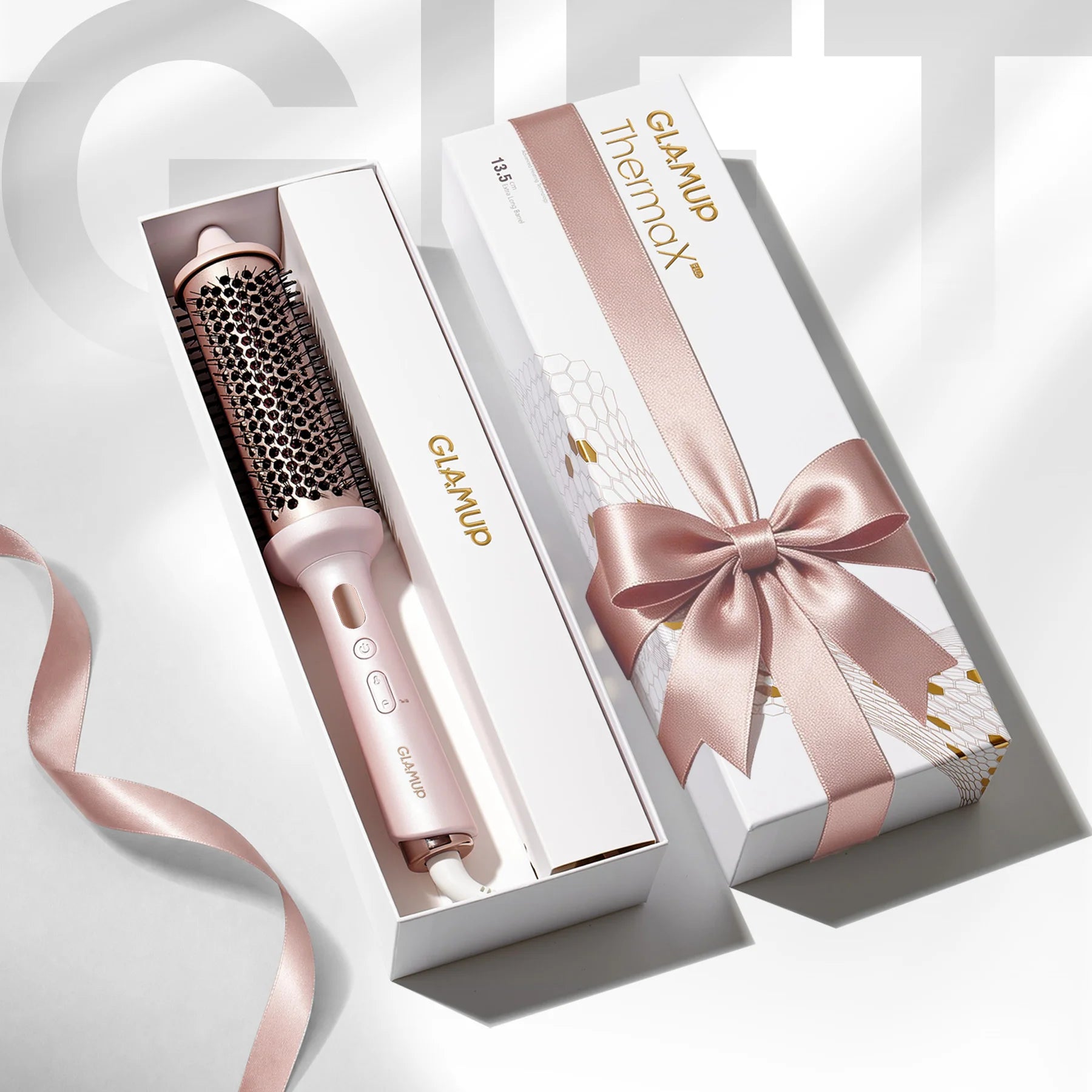 Unboxing of GLAMUP ThermaX Plus styling brush in a luxury ribbon gift packaging for women.