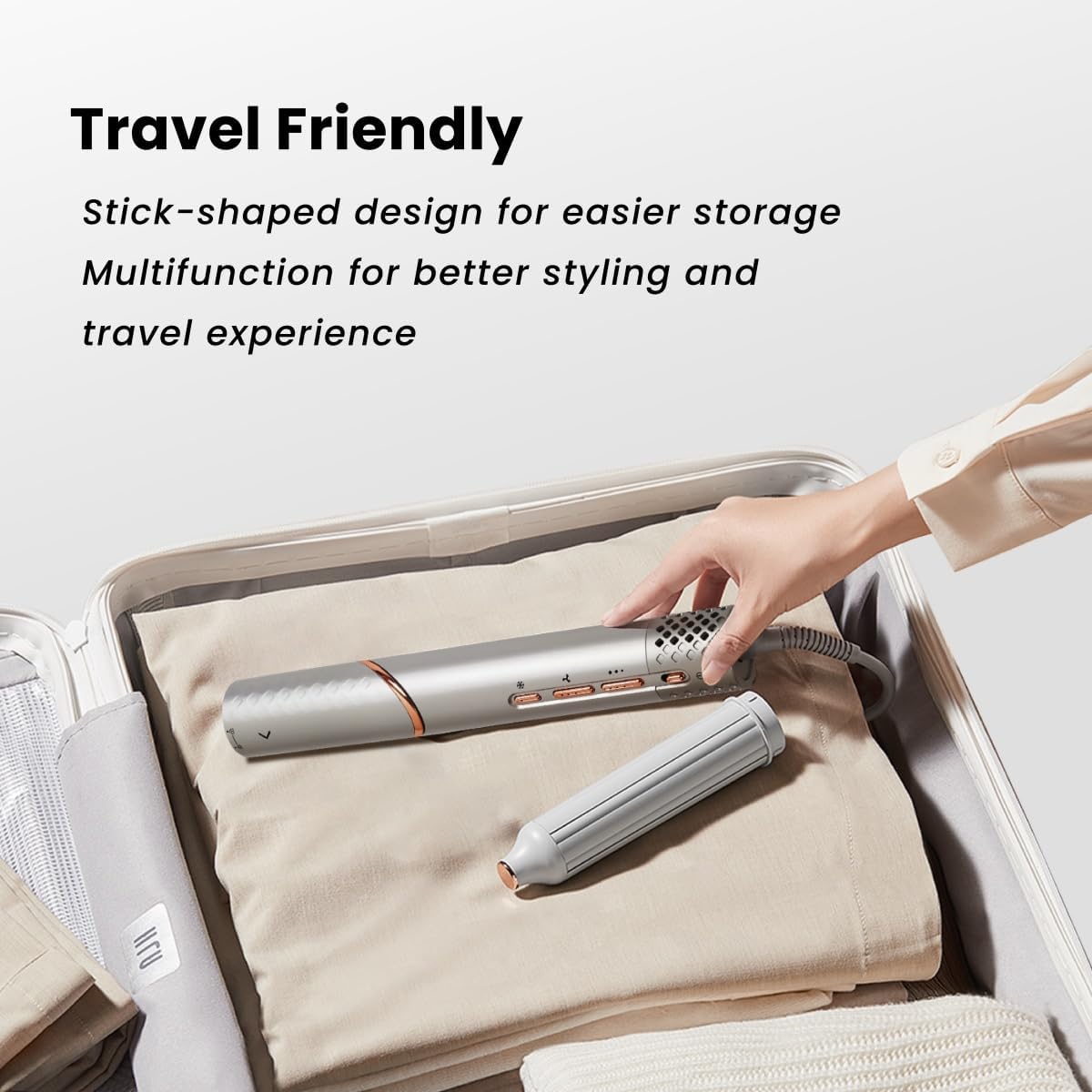 GLAMUP travel friendly stick-shaped hair styler packing easily into a suitcase for storage.