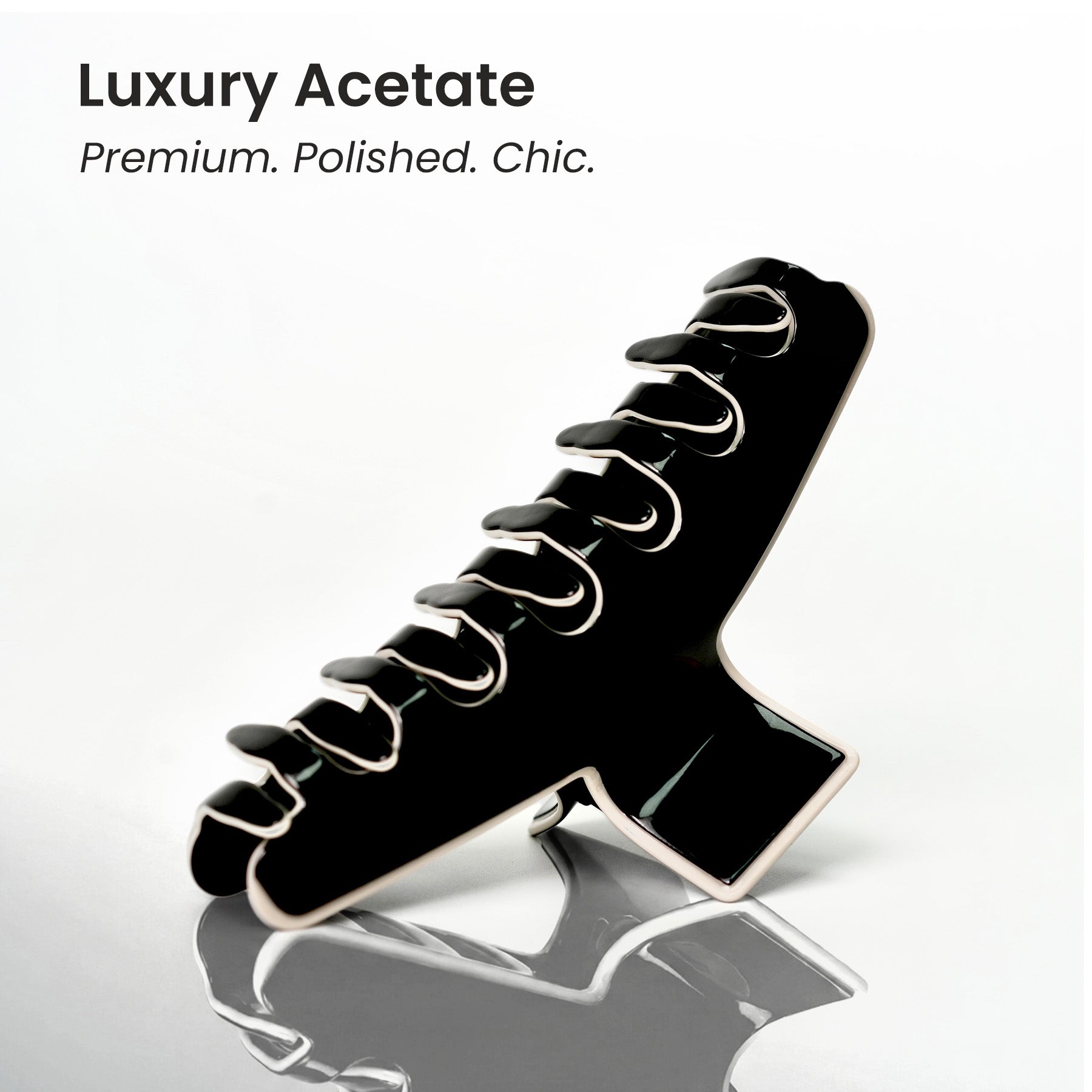 A close-up of a polished Kendall hair clip, showcasing the luxury acetate finish that is both premium and chic.